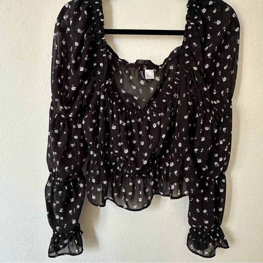 Divided Black Blouse with White Floral Design